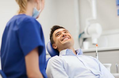 appleton man smiling in dental chair