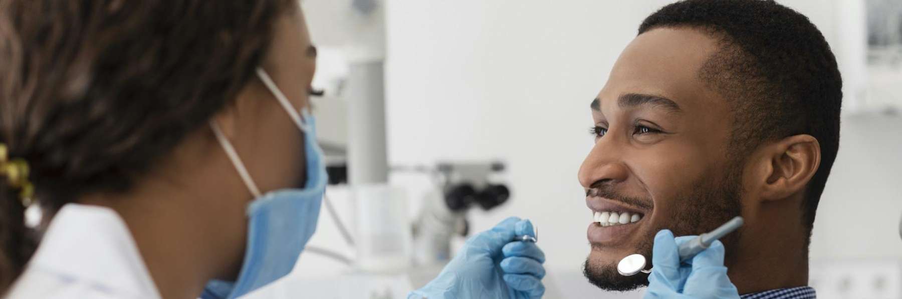 hamlin man smiling during dental exam